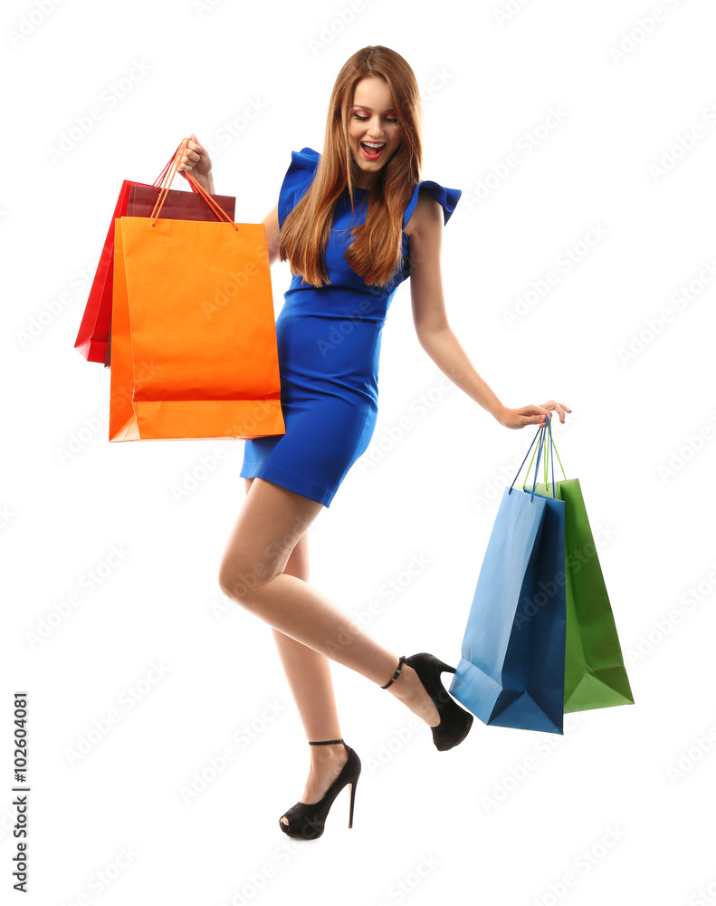 Young pretty woman with shopping packages isolated on white