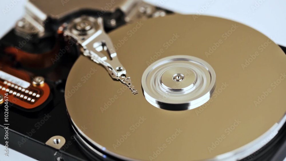 hdd data recovery - coseup of computer hard disc spinning hdd data recovery - coseup of computer hard disc spinning
