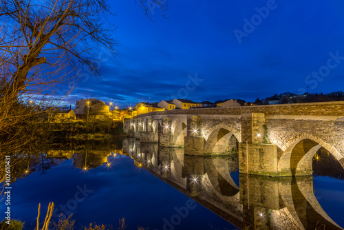 The Roman Bridge in Lugo during blue hour at the Camino Primitivo, a World Heritage