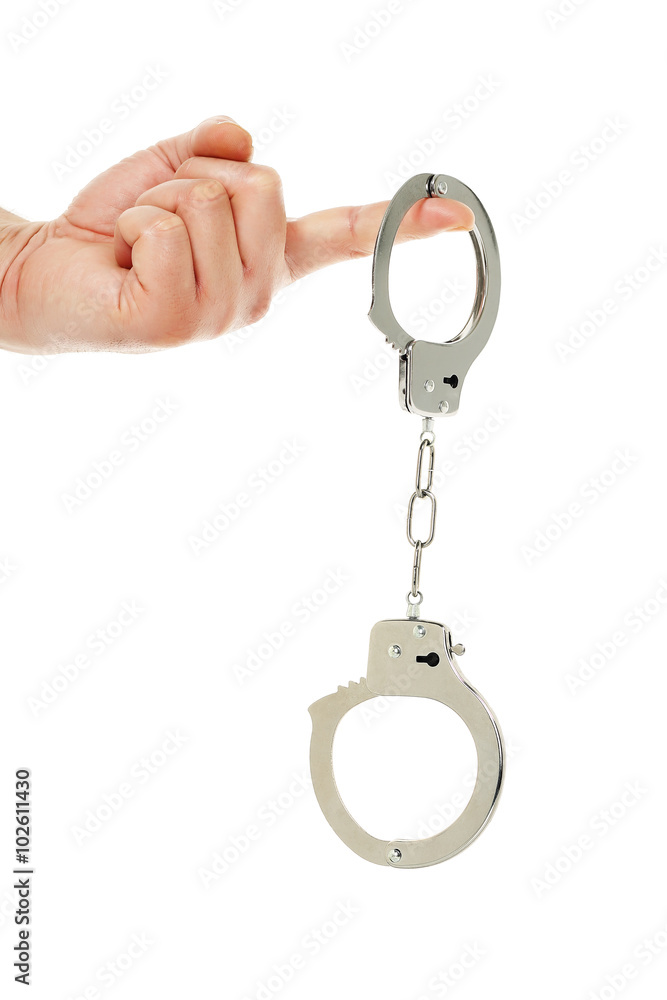 hand with handcuffs hand with handcuffs