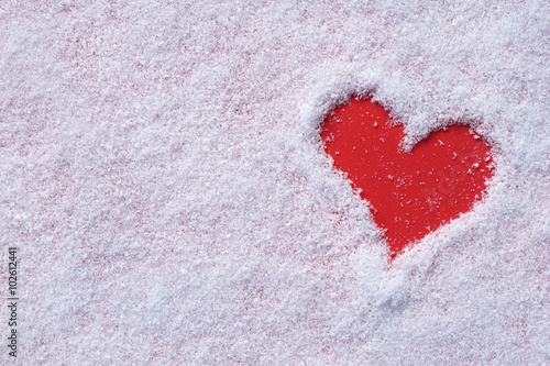 Snow background inside a red heart. Happy Valentines day. love concept