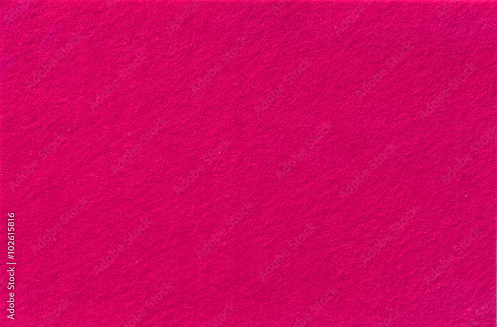 Fototapeta premium Bright pink Felt Background for design. View from above. Close up.
