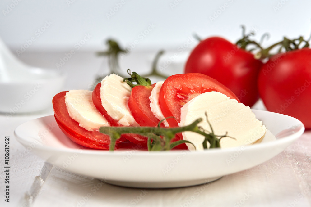 Caprese salad with tomatos and mozzarella
