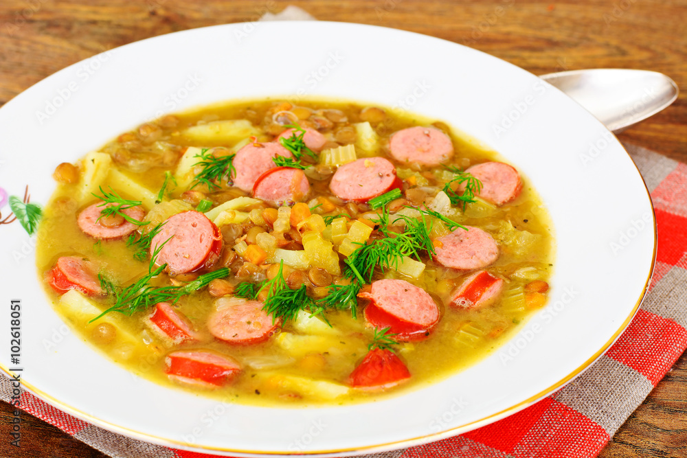 Healthy and Diet Food: Soup with Lentils, Celery and Sausage