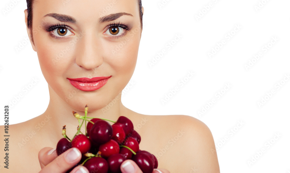 Portrait of a beautiful woman with a sweet cherry Portrait of a beautiful woman with a sweet cherry
