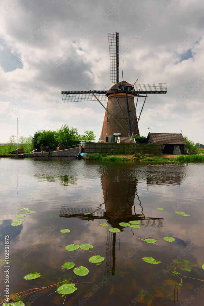 dutch windmill over water