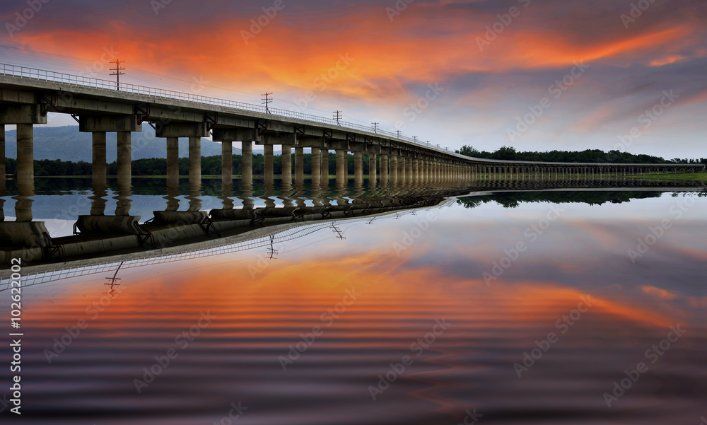 Railway Bridge over a large reservoir in Thailand.