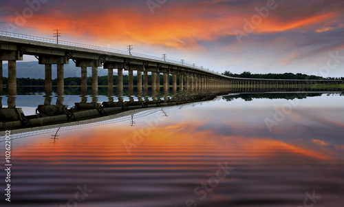Railway Bridge over a large reservoir in Thailand.