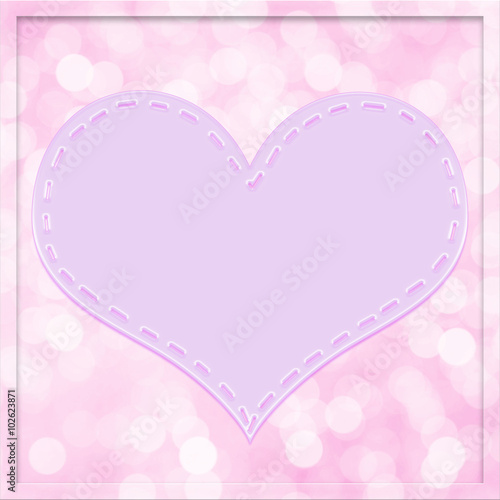 Heart on pink bokeh background