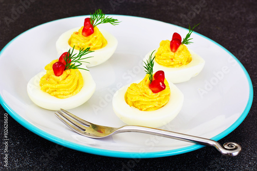 Tasty Stuffed Eggs with Pomegranate