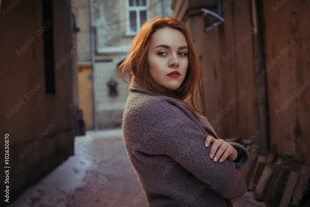 Obraz premium Beautiful woman with red hair