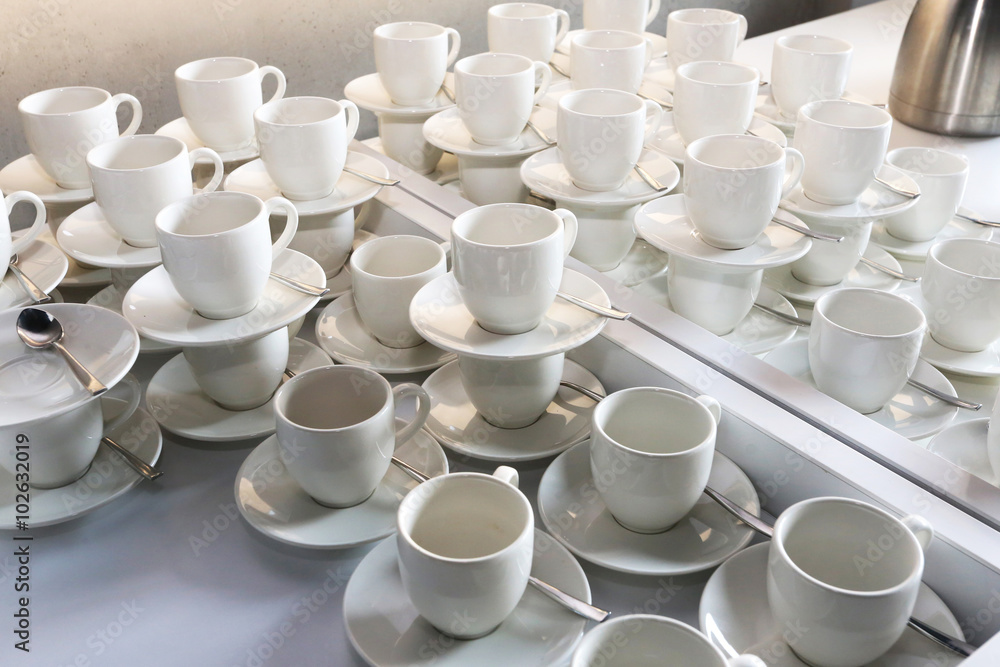 Coffee cups lined up in cafeteria or coffee house Coffee cups lined up in cafeteria or coffee house