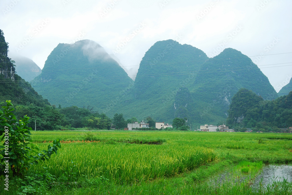 The beautiful mountains and rural scenery in raining, Guilin, China
