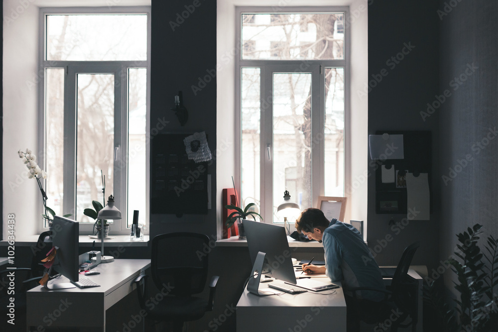 Fototapeta premium Designer at work in office