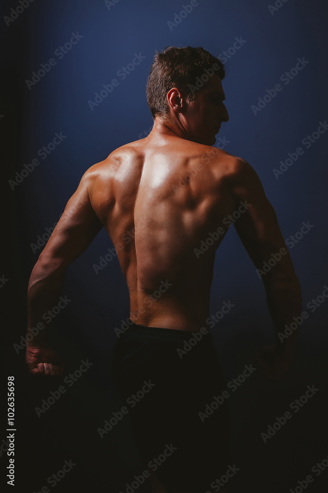 Fototapeta premium Man showing sports figure