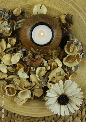 candle and dry flowers