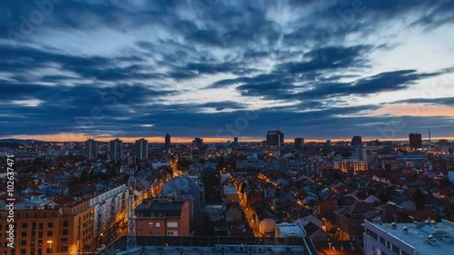 Time lapse of a sunrise during winter over the city of Zagreb in Croatia, with Cibona and Zagrepcanka in 4k photo