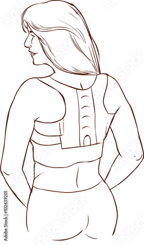 he girl in the corrector for the spine on a white background.