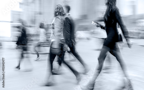 group of business people in the street and blue tonality