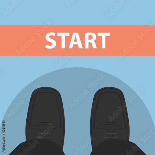 Businessman feet in front of start line