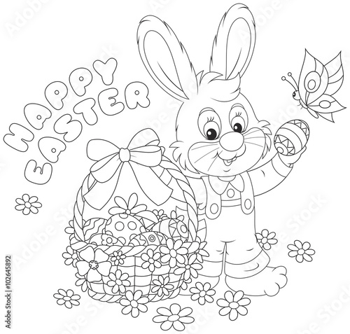 Little bunny with a happy Easter greeting and with a decorated basket of painted eggs