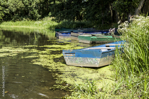 Old boat on the lake © bzyxx