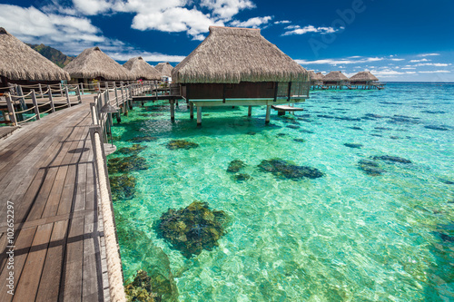 Over water villas on a tropical lagoon of Moorea Island, Tahiti