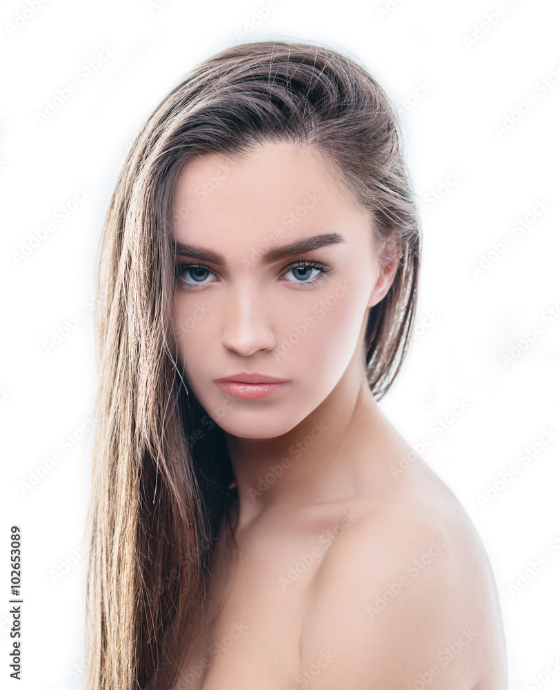 Portrait of beautiful girl with brown hair on white background Portrait of beautiful girl with brown hair on white background
