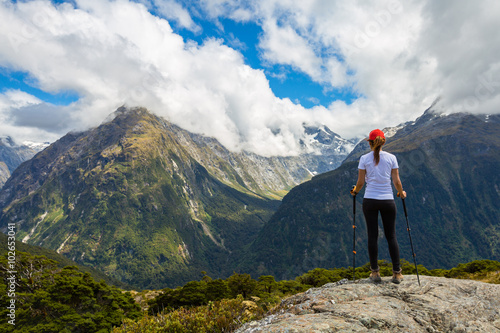 Fototapeta Woman hiker enjoys the view of Key Summit with Ailsa Mountain at