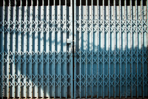 old blue steel door closed.
