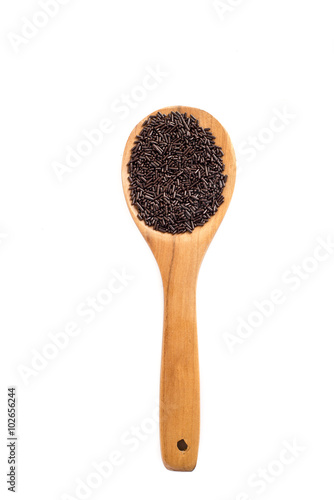 Chocolate on paddle with white background.