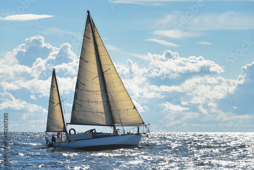 Fotografie Old expensive vintage two-masted sailboat (yawl) close-up, sailing in an open sea
