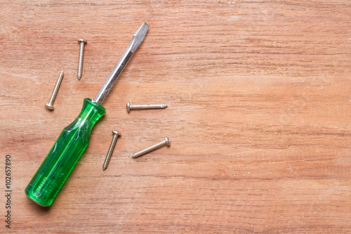 Obraz na płótnie screwdriver on wood background w salonie