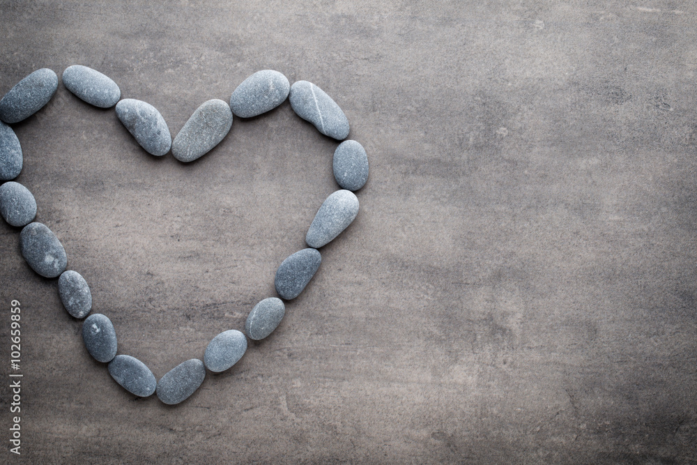 Heart from the spa stones, on the grey background. Heart from the spa stones, on the grey background.