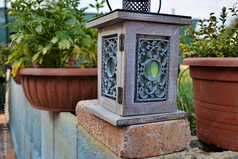 lantern on bricks wall at summertime, Garden lamp with two flowerpots, vintage kerosene lamp isolated on garden background, lantern on bricks wall at summertime, Garden lamp with two flowerpots, vintage kerosene lamp isolated on garden background,