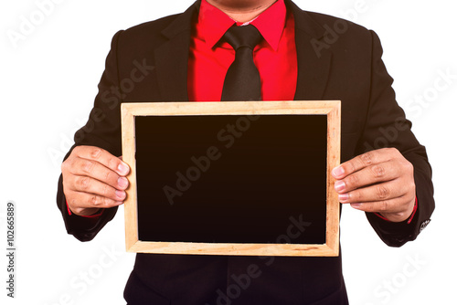 Businessman holding board on the white background