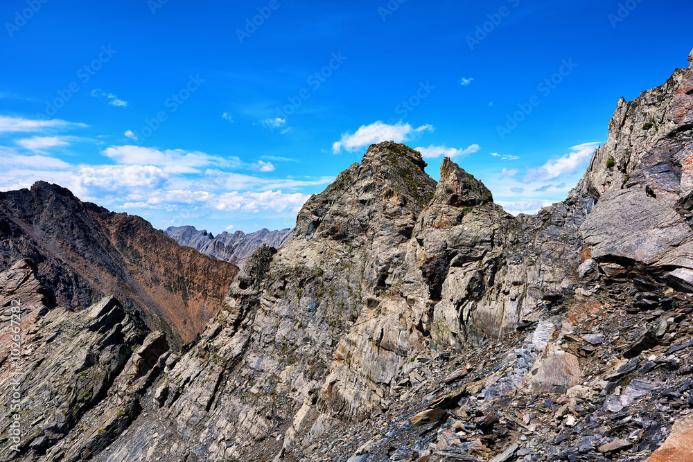 Crest of high ridge with a steep slope Crest of high ridge with a steep slope