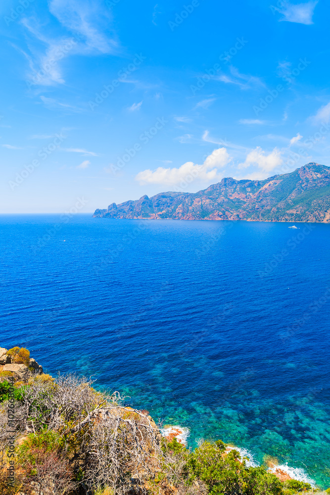 A view of blue sea on coast of Corsica island near Girolata bay, France