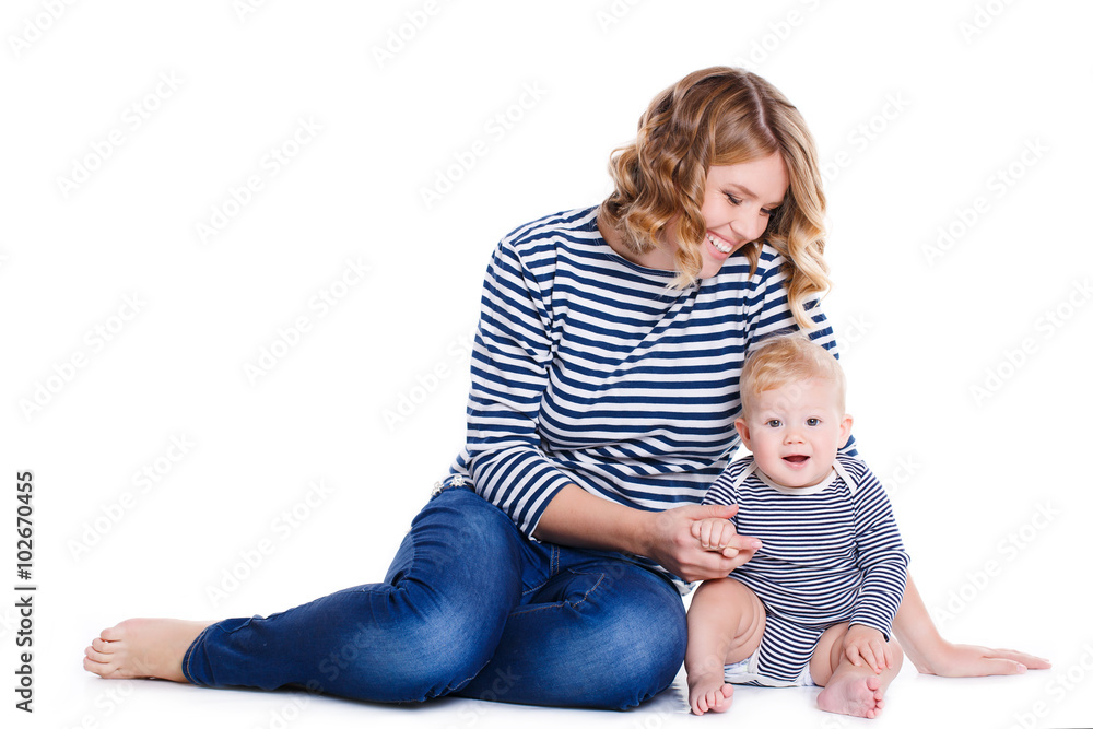 Portrait of happy mother with baby on a white background. Portrait of happy mother with baby on a white background.