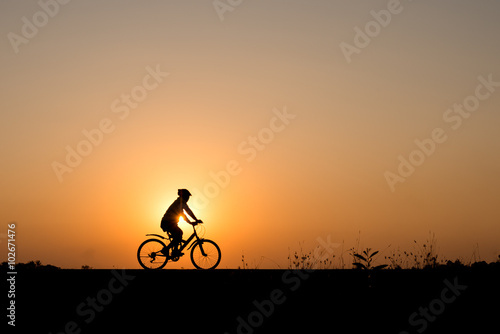 Wallpaper Mural Silhouette of cyclist motion on sunset background Torontodigital.ca