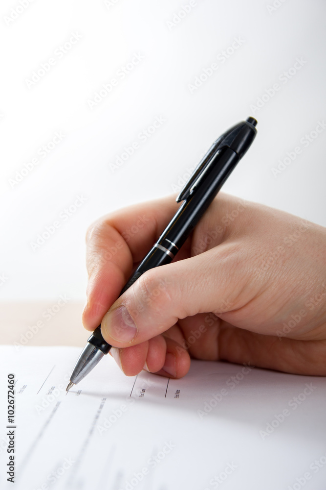 Businessman's hand signing papers. Lawyer, realtor, businessman Businessman's hand signing papers. Lawyer, realtor, businessman