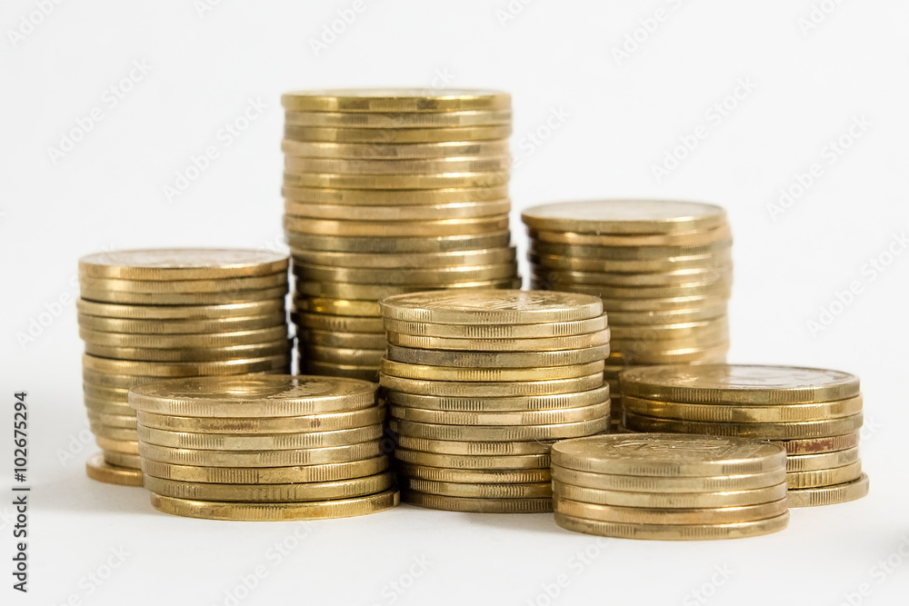Columns of golden and silver coins isolated on white background. Money concept, investment bank Columns of golden and silver coins isolated on white background. Money concept, investment bank