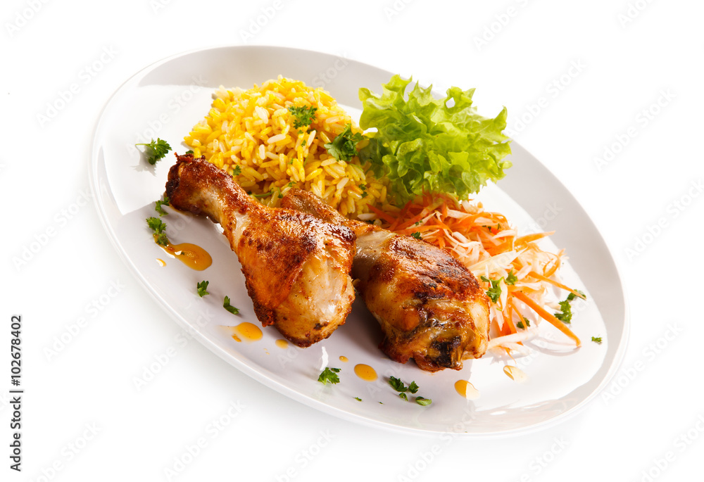 Roasted chicken drumsticks white rice and vegetables