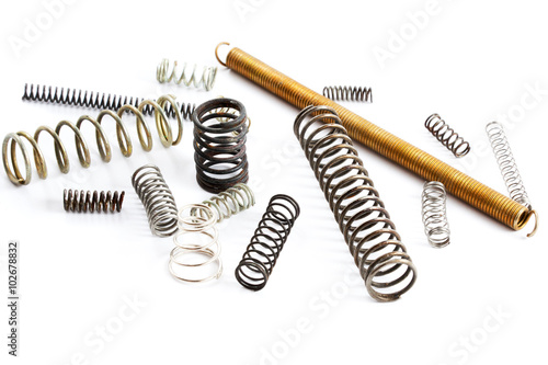 Old metal springs isolated on white background photo