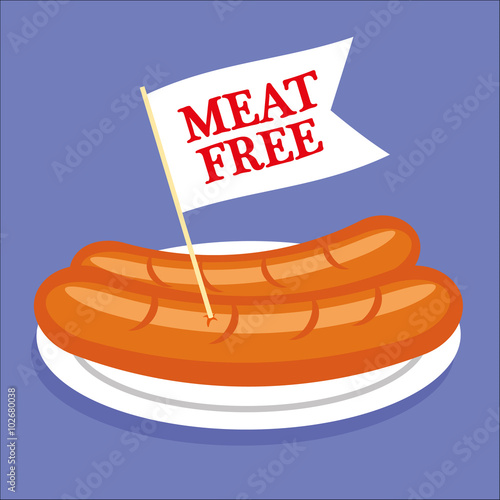 Two sausages or hot dogs on a plate with a white flag sticking out and the words Meat Free added in red text