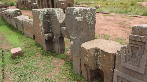Row of megalithic stones in the complex Puma Punku near Tiwanaku, Bolivia photo