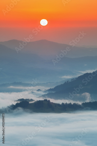 Carpathian Mountains. Mountains covered in mist at sunrise