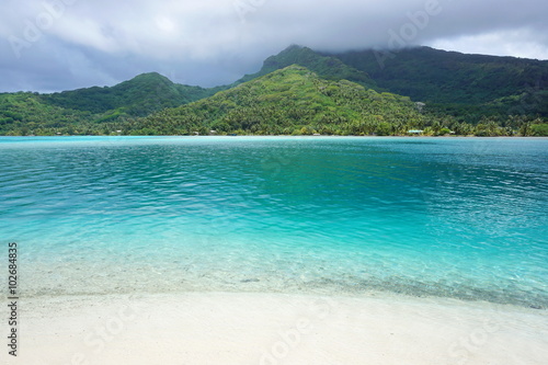 Landscape Huahine island from white sand beach