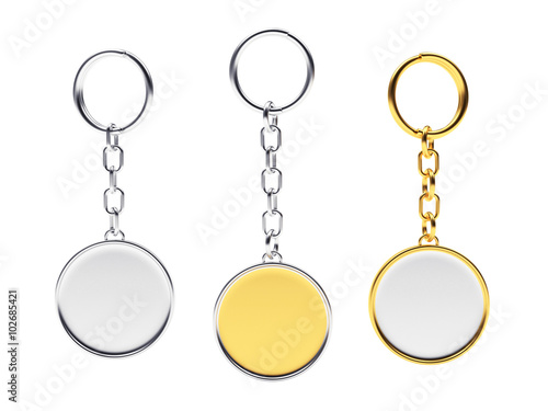 Blank round golden and silver key chains with key rings isolated on white background