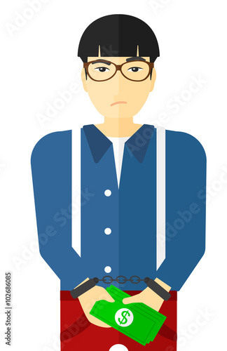 Man handcuffed for crime.